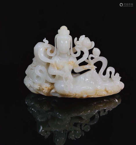 A HETIAN JADE SITTING GUANYIN CARVING