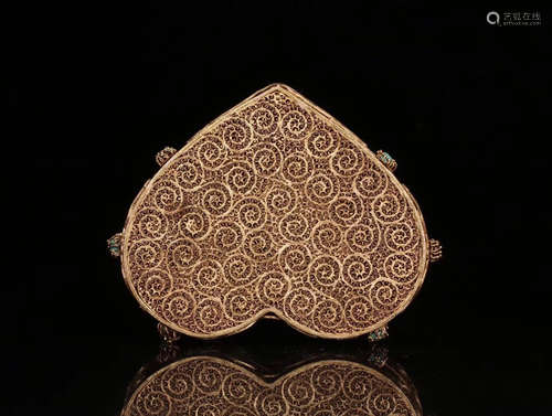 A COPPER GILT HEART SHAPED BOX