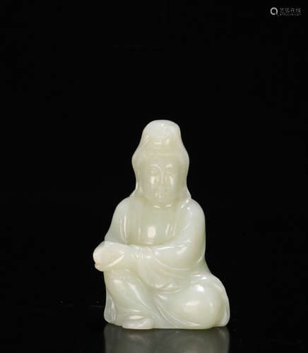 A HETIAN JADE CARVED GUANYIN FIGURE