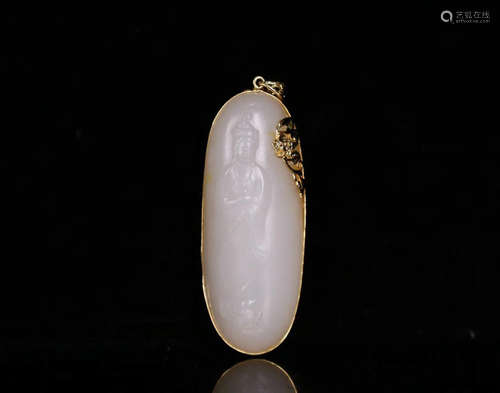 A HETIAN JADE CARVED GUANYIN DESIGN PENDANT