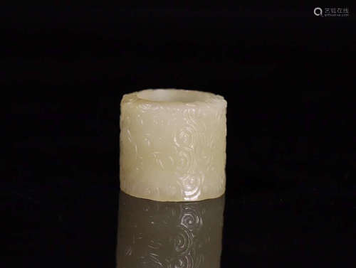 A HETIAN JADE CARVED THUMB RING