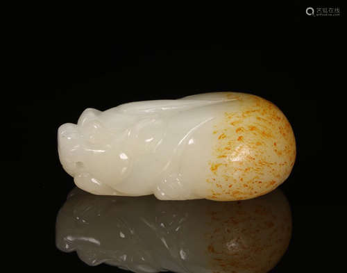 A HETIAN JADE BEAST SHAPED PENDANT