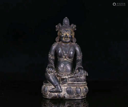 A TIBETAN BLACK STONE MONEY-BUDDHA CARVING