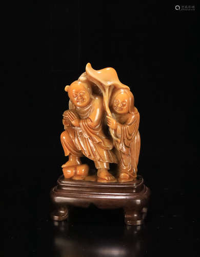 A TIANHUANG STONE CARVED FIGURE PENDANT