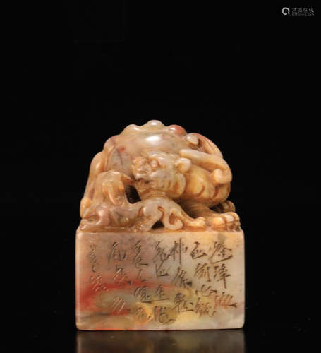 A SOAPSTONE CARVED BEAST SHAPED SEAL