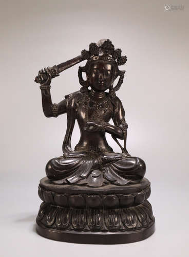 A ZITAN WOOD CARVED WENSHU BUDDHA