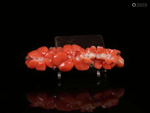 A NATURAL CORAL FLORAL SHAPED PENDANT