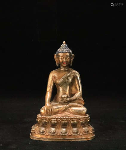 A GILT BRONZE MEDICAL BUDDHA