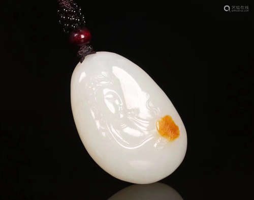 A HETIAN JADE CARVED GUANYIN DESIGN PENDANT