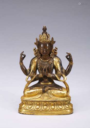 A GILT-BRONZE FIGURE OF FOUR-ARMED BODHISATTVA