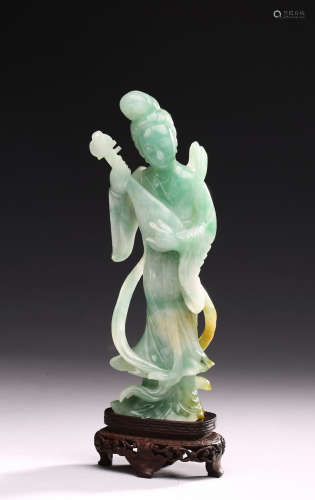 A JADEITE CARVED FIGURE OF GUANYIN WITH INSTRUMENT