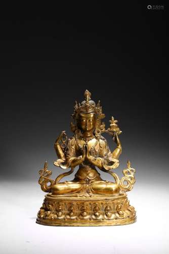 A GILT BRONZE FIGURE OF FOUR-ARMED BODHISATTVA