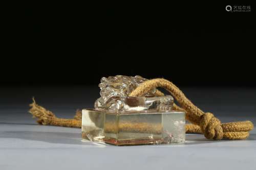 A CRYSTAL CARVED 'DRAGON' SEAL