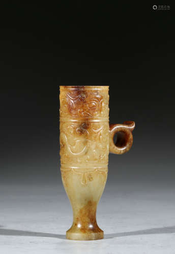 AN ARCHAISTIC YELLOW JADE 'CHILONG' STEM CUP