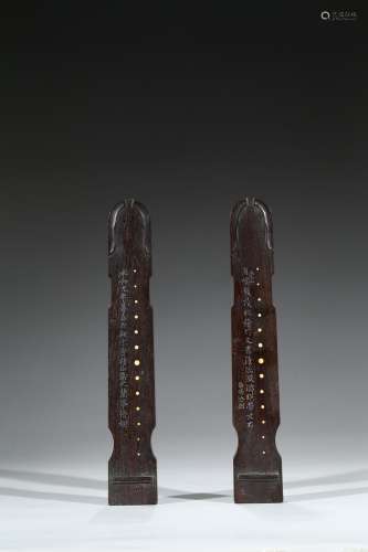 A PAIR OF ZITAN QIN-SHAPED INSCRIBED WRISTRESTS