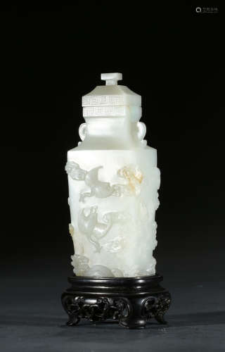 A WHITE JADE 'CRANE' VASE AND COVER