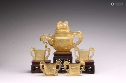 A SET OF FIVE SMOKY QUARTZ TEAPOT AND CUPS