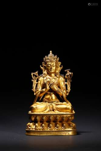 A GILT-BRONZE FIGURE OF SEATED BODHISATTVA