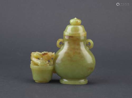 A YELLOW JADE CARVED 'CHILONG' JOINED VESSEL