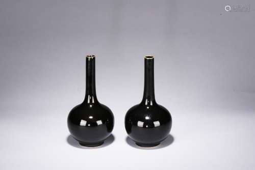 A PAIR OF MIRROR BLACK GLAZED VASES