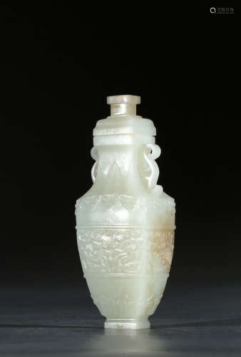 A SMALL JADE CARVED 'MYTHICAL BEAST' VASE