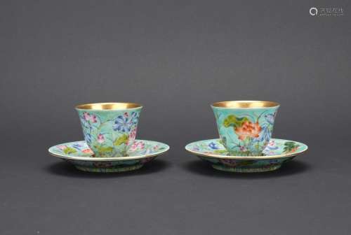 A PAIR OF FAMILLE ROSE 'LOTUS' CUPS AND HOLDERS