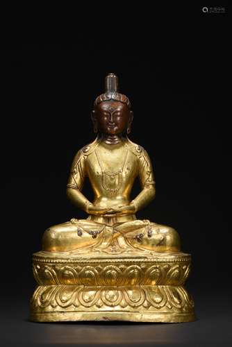 A GILT-BRONZE FIGURE OF AMITABHA