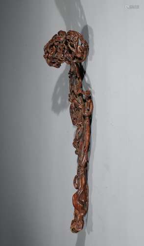 A NATURALISTIC AGARWOOD CARVED RUYI SCEPTER