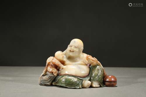 A PAINTED SOAPSTONE CARVING OF LUOHAN