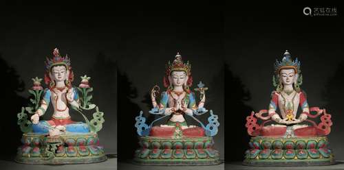 A SET OF THREE LARGE PAINTED BRONZE BODHISATTVAS