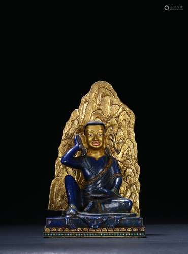 A LAPIS LAZULI CARVED FIGURE OF MILAREPA