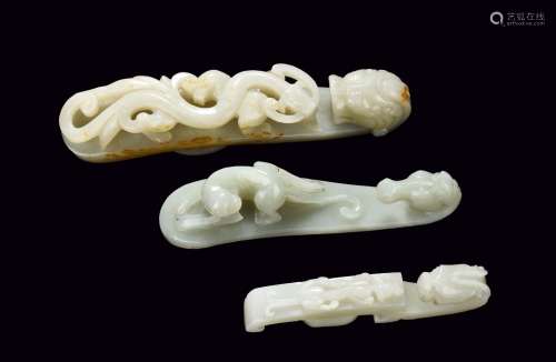 A SET OF THREE WHITE JADE BELT HOOKS