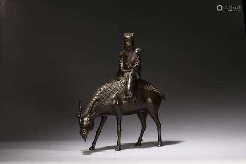 A BRONZE 'IMMORTAL ON RAM' INCENSE BURNER