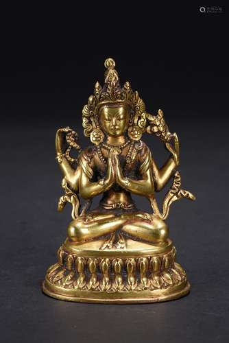 A GILT-BRONZE FIGURE OF SEATED BODHISATTVA