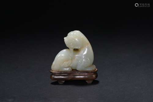 A WHITE JADE CARVED MYTHICAL BEAST