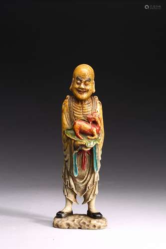 A SHOUSHAN STONE FIGURE OF ARHAT