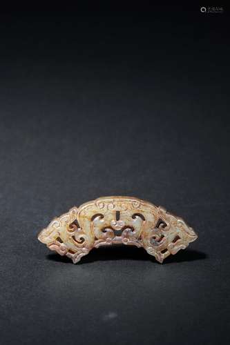 AN ARCHAIC 'DRAGON' JADE PENDANT HUANG