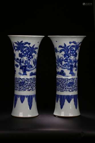 A PAIR OF WHITE AND BLUE 'FIGURE' BEAKER VASE