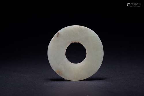 A ARCHAIC WHITE JADE CARVED BI