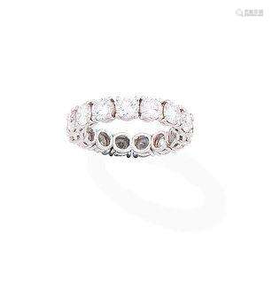 A diamond eternity ring, by Asprey and Garrard