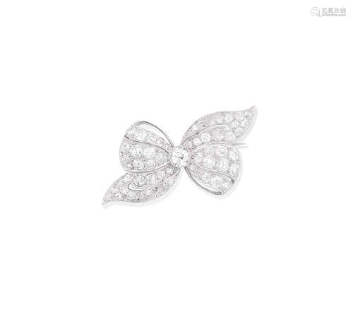 A diamond bow brooch