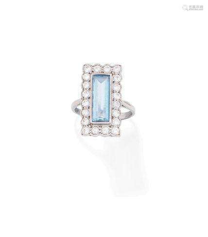 An aquamarine and diamond dress ring