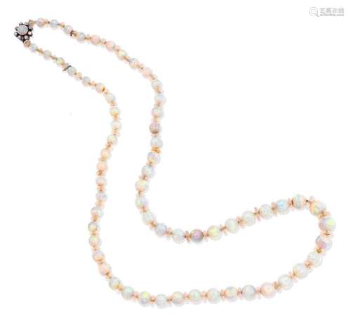 An opal bead and rock crystal necklace, circa 1915