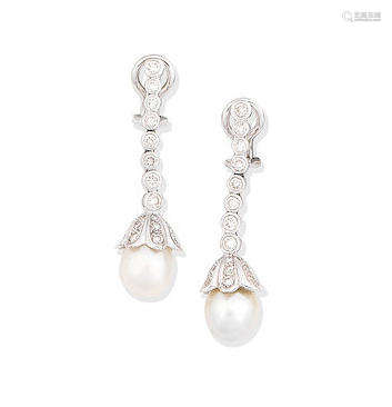 A pair of natural pearl and diamond earrings