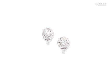 A pair of diamond cluster earrings