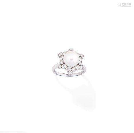 A cultured pearl and diamond ring