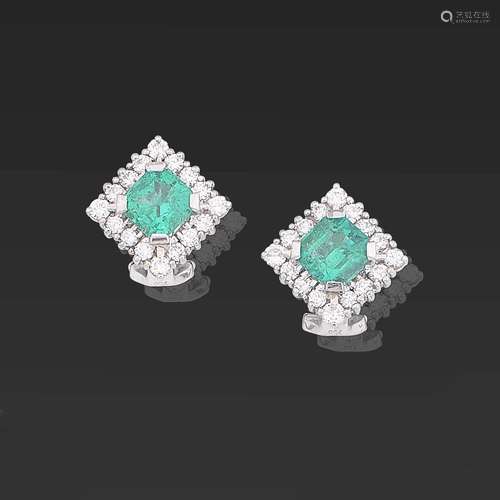 A pair of emerald and diamond cluster earrings