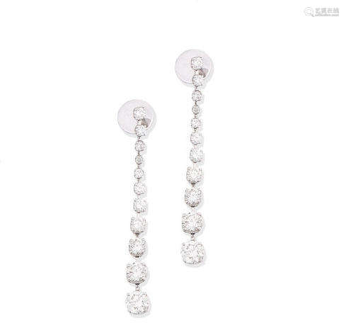 A pair of diamond pendant earrings