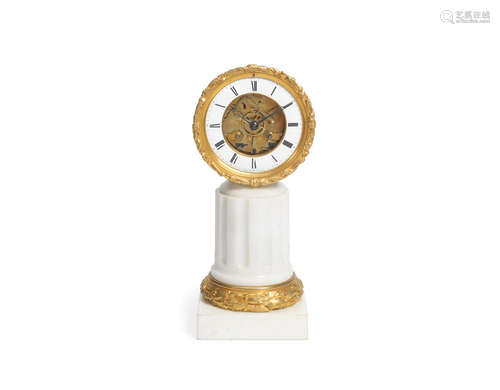 the dial and movement signed Henri Marc, Paris A late 19th French gilt bronze and white marble mantle clock