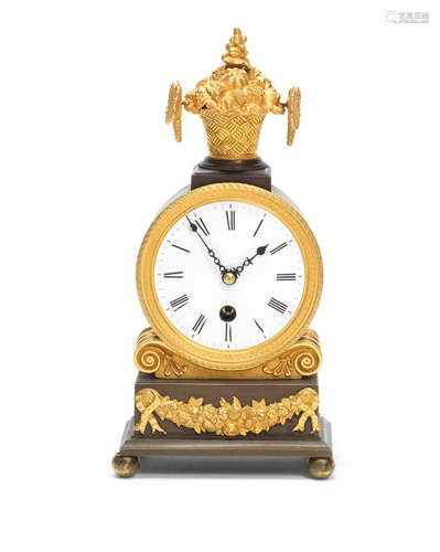 An early 19th century English gilt and patinated bronze mantel timepiece  (2)